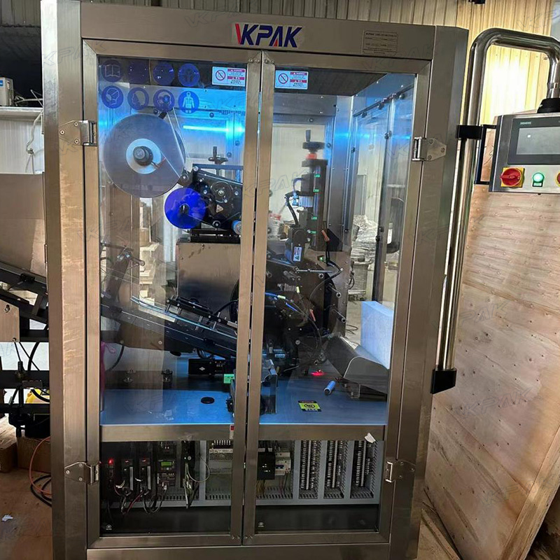 ម៉ាស៊ីនដាក់ស្លាកបំពង់ទន់ផ្លាស្ទិចដោយស្វ័យប្រវត្តិ ជាមួយនឹងប្រព័ន្ធផ្តល់ចំណីតាមបំពង់