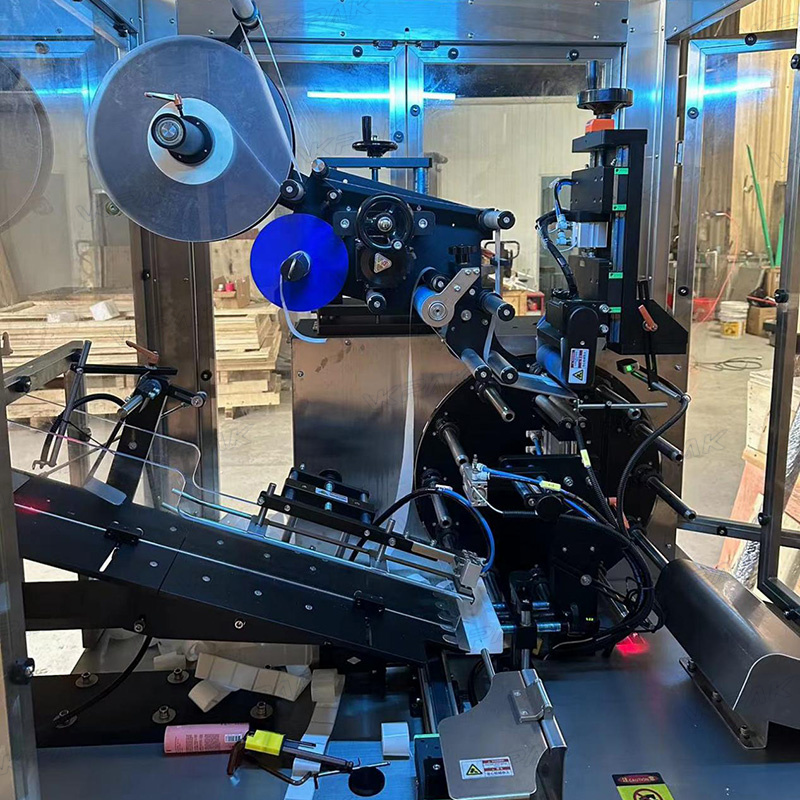 ម៉ាស៊ីនដាក់ស្លាកបំពង់ទន់ផ្លាស្ទិចដោយស្វ័យប្រវត្តិ ជាមួយនឹងប្រព័ន្ធផ្តល់ចំណីតាមបំពង់