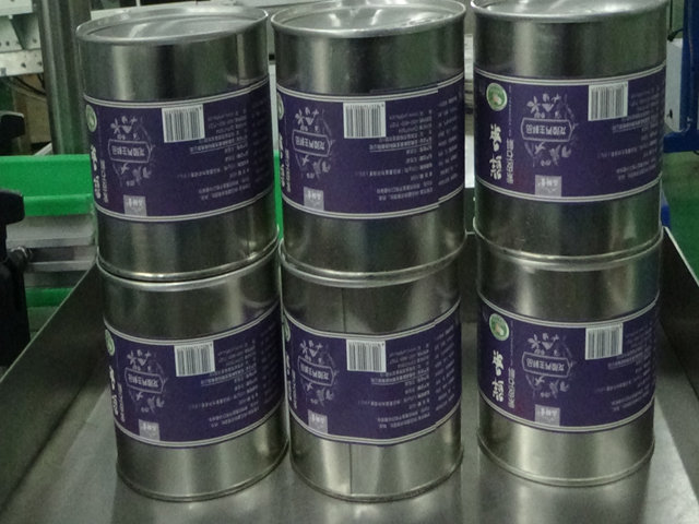 automatic vertical round bottle labeling equipment Round Cans LABELER ETIKETTIERMASCHINE.jpg