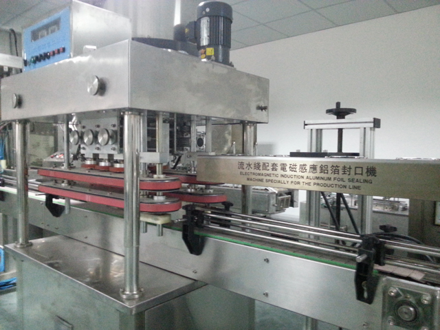 capping machine automatic high speed ល្បឿនលឿន capping machinery.jpg