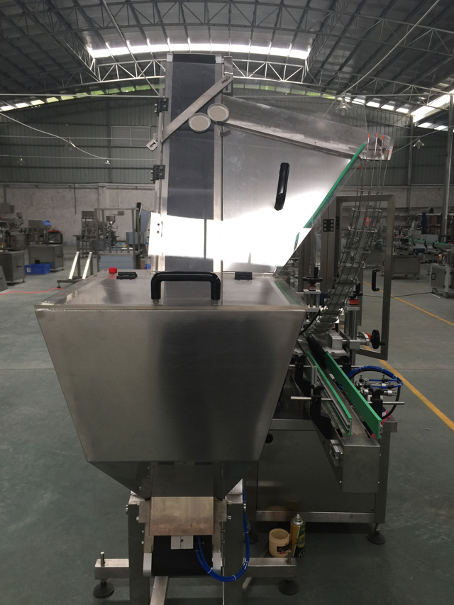 caps ដោយស្វ័យប្រវត្តិ feeding system.jpg