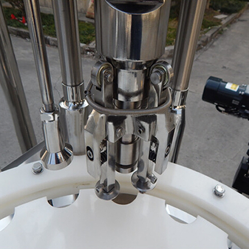 ropp capping heads for vial capper ដប ROPP capping equipment.jpg