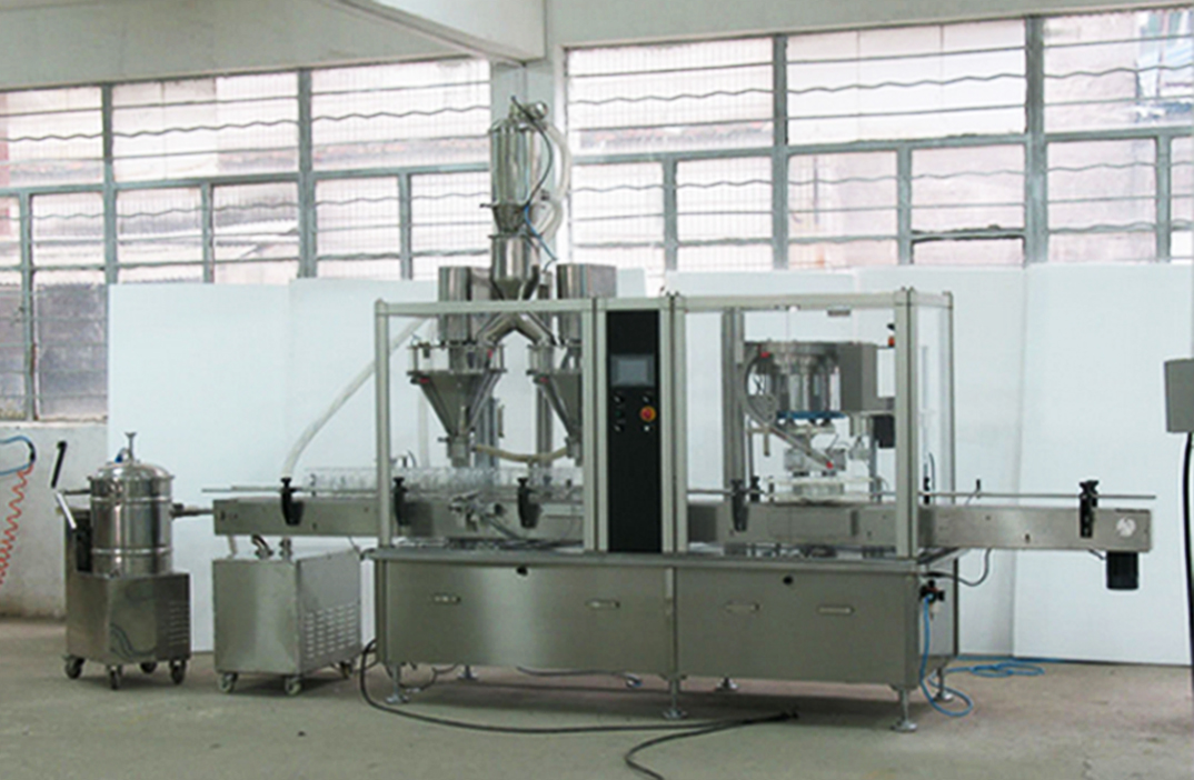 2 heads filling capping machine pharma bottles ម៉ាស៊ីនវេចខ្ចប់ម្សៅក្បាលពីរ.jpg
