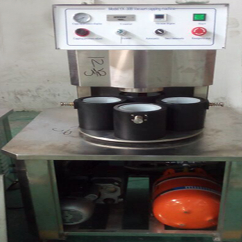 illustration of vacuum capping machine semi automatic រូបភាពសម្រាប់ vacuum capping.jpg