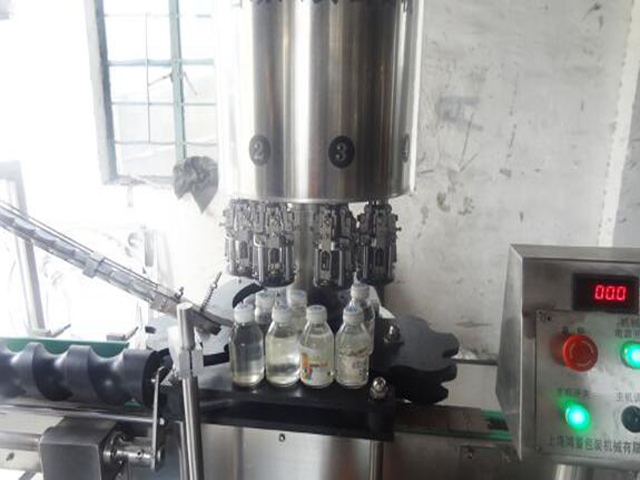 នៅខាងក្នុង ropp capping machinery.jpg