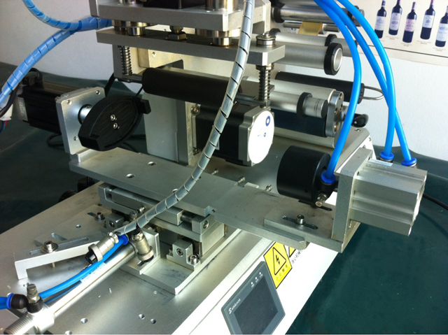 ម៉ាស៊ីនដាក់ស្លាក ក្បាល .jpg