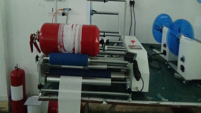 ឧបករណ៍ស្លាកសញ្ញាសម្រាប់ផលិតផលពន្លត់អគ្គីភ័យ។