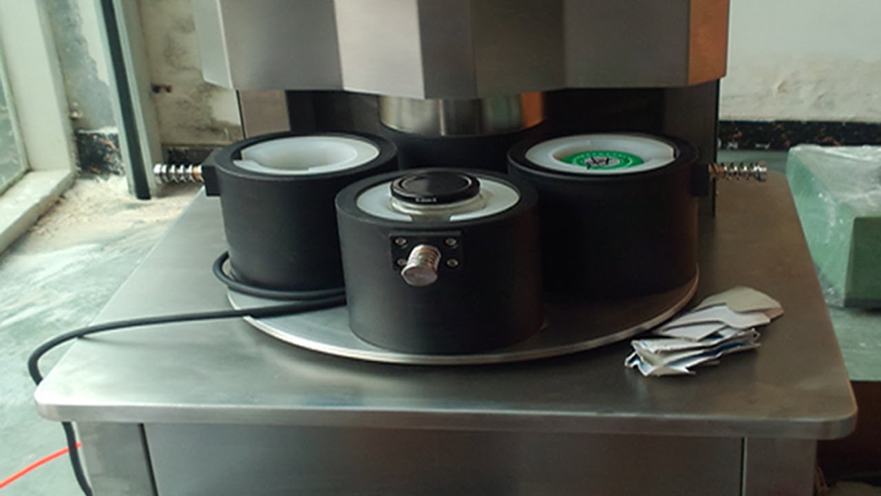 four heads vacuum capping machine semi automatic ម៉ាស៊ីនបូមធូលី manual.jpg