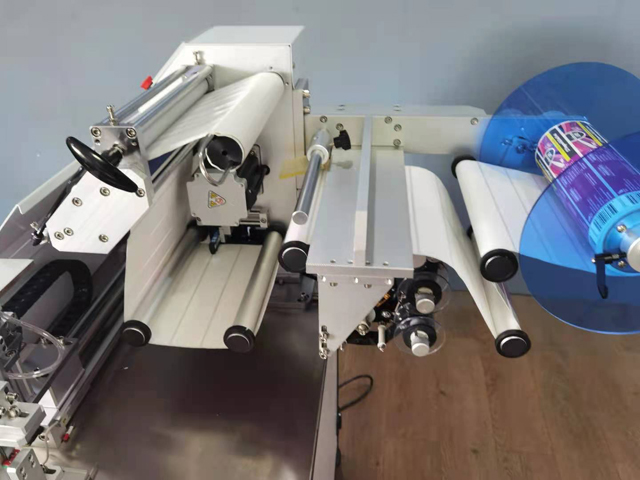 ម៉ាស៊ីនដាក់ស្លាកសាច់ក្រក (3.jpg